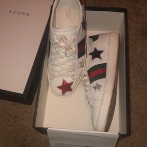 Two Gucci sneakers lightly wear size 8.5 both